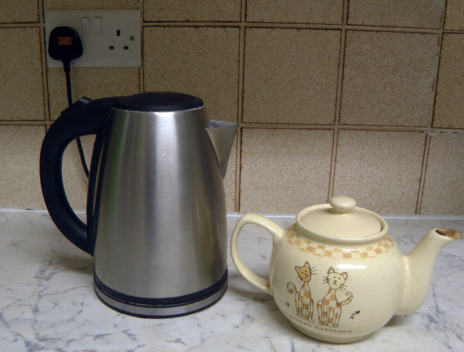 Kettle Plugged Photos, Images and Pictures